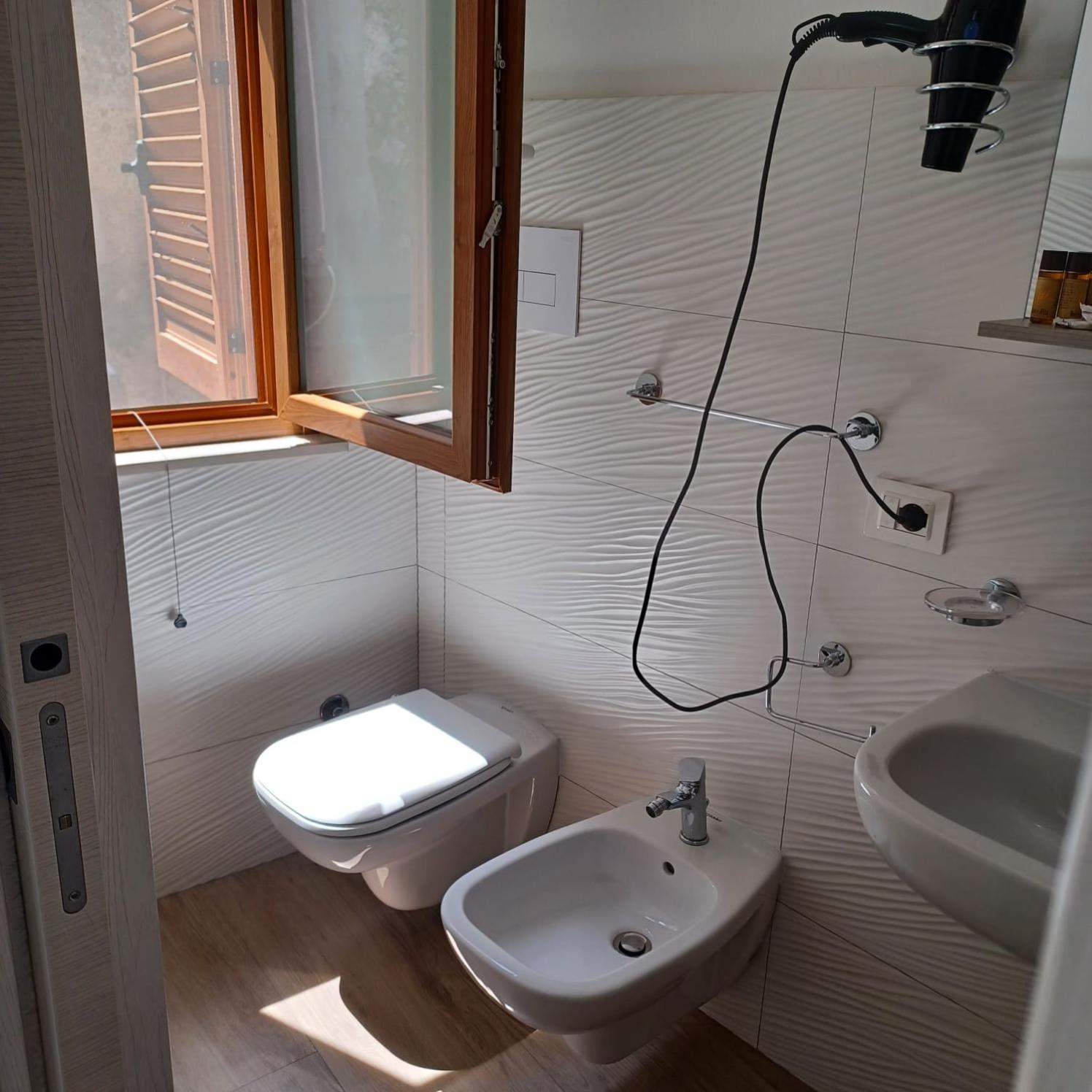Casa Vacanze B&B Ondes กาเมรอตา ภายนอก รูปภาพ
